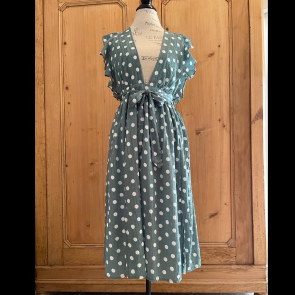 Green and white polka dot dress